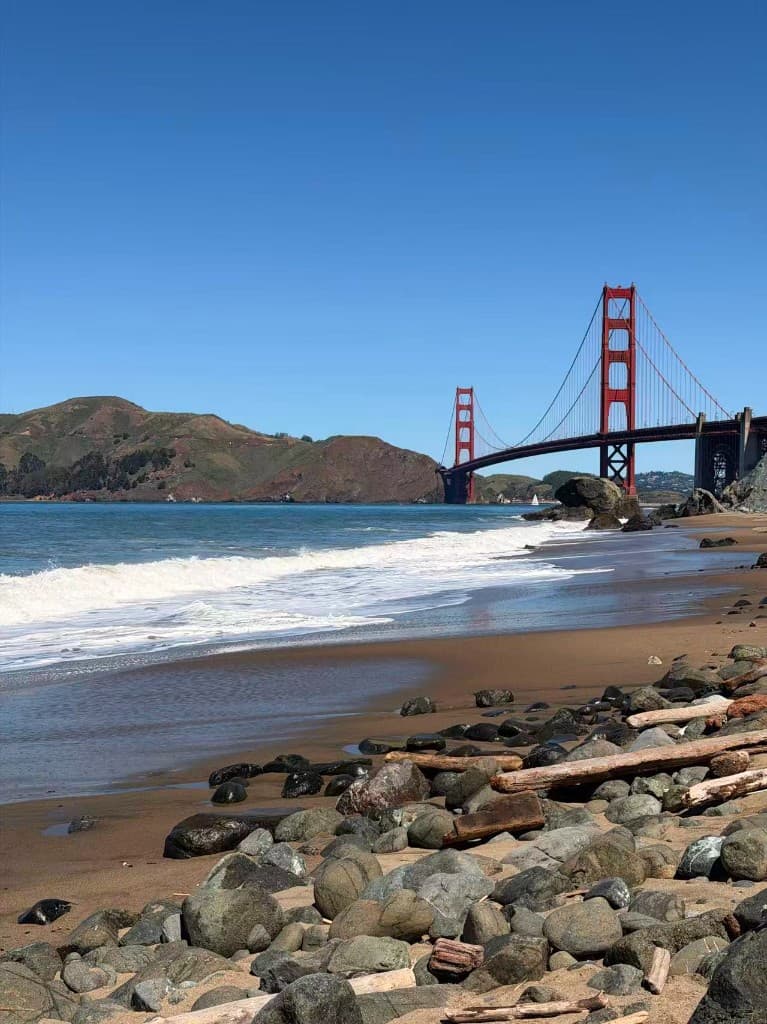 Golden Gate Bridge from a rocky beach in San Francisco