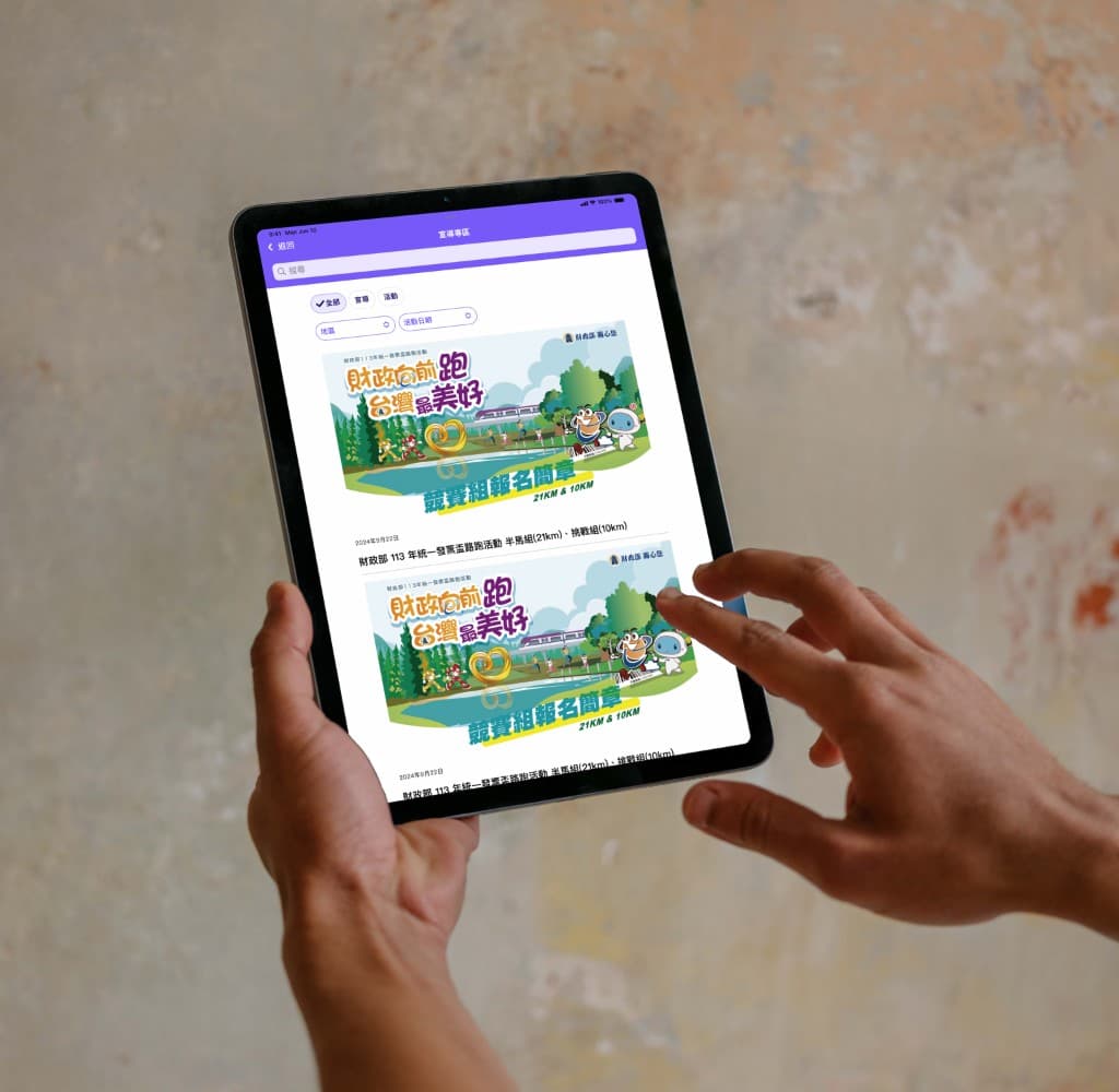 Person interacting with an iPad showing the e-invoice app in a neutral indoor setting